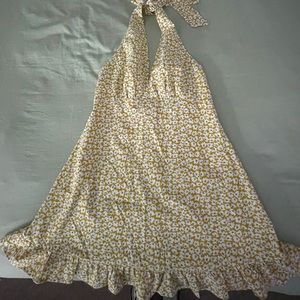 This dress is super cute!! Very summer!! Only worn a couple of times!!